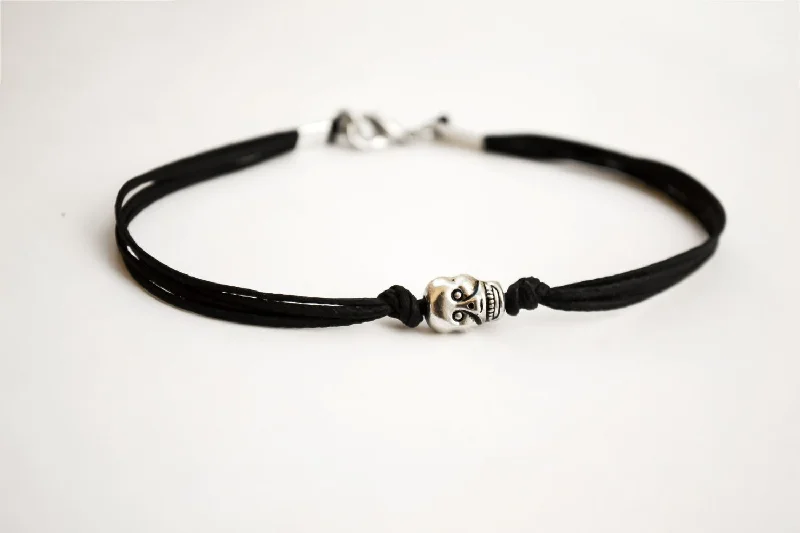 Men's bracelet with a silver skull bead charm and a black cord, gift for him