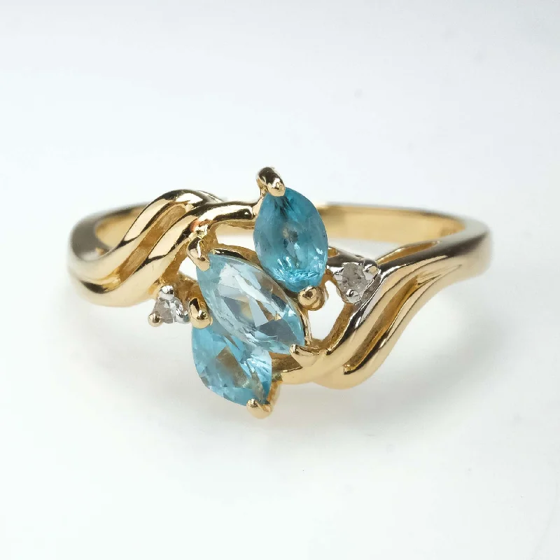 0.57ctw Blue Topaz with Diamond Accents Gemstone Ring in 14K Yellow Gold